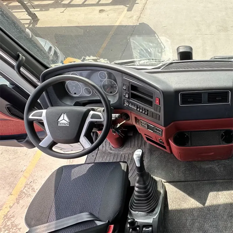 Ergonomic steering wheel and control layout in a Howo truck interior